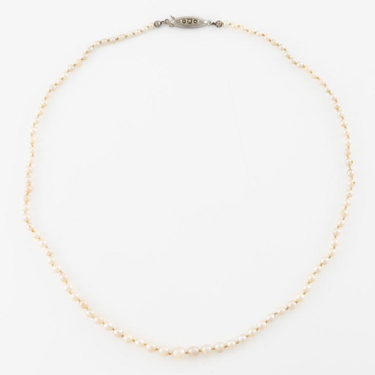 Pearl necklace, graduated pearls, clasp silver with pyrite.