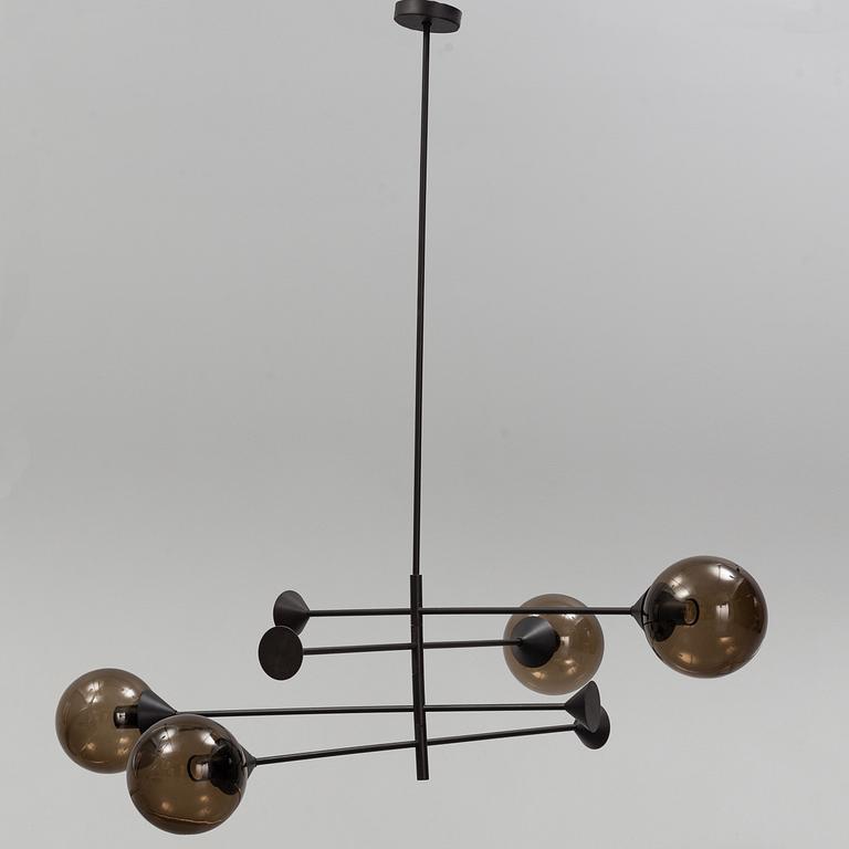 A 21st century "Kendama" LED pendant lamp, design Massimo Zazzeron, Giorgetti.