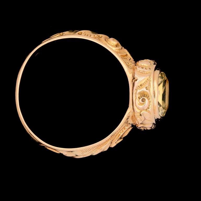 RINGAR, 2 st, 18k guld med gul citrin o svart sten. Bla 1830/40-tal. Tot vikt 9,2g.