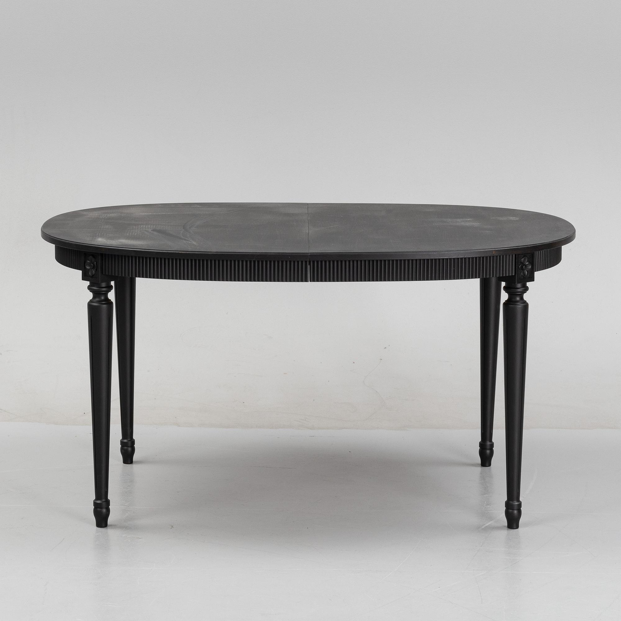 A Gustavians style dining table, second half of the 20th Century.