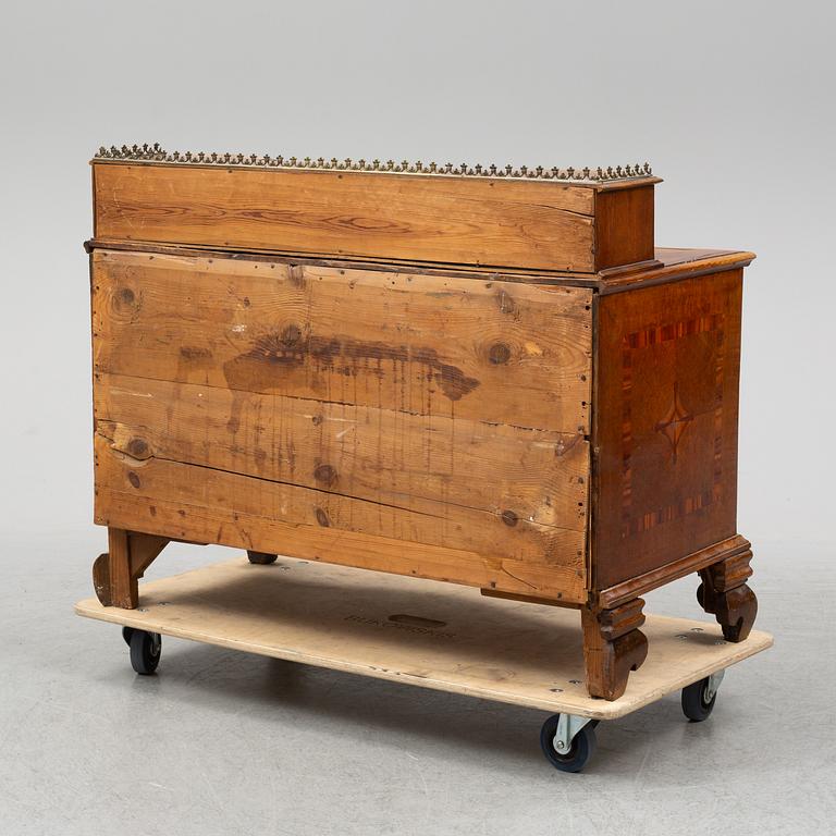 A late baroque chest of drawers, mid 18th century.