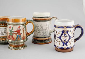 A set of eight majolica mugs from Rörstrand, around the turn of the century 1900.