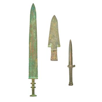 Two bronze daggers and a sword, preusmably Han dynasty (220 BC - 206 AD).