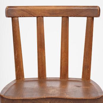 Axel Einar Hjorth, a set of six stained pine "Utö" chairs, Nordiska Kompaniet, Sweden, 1930s.