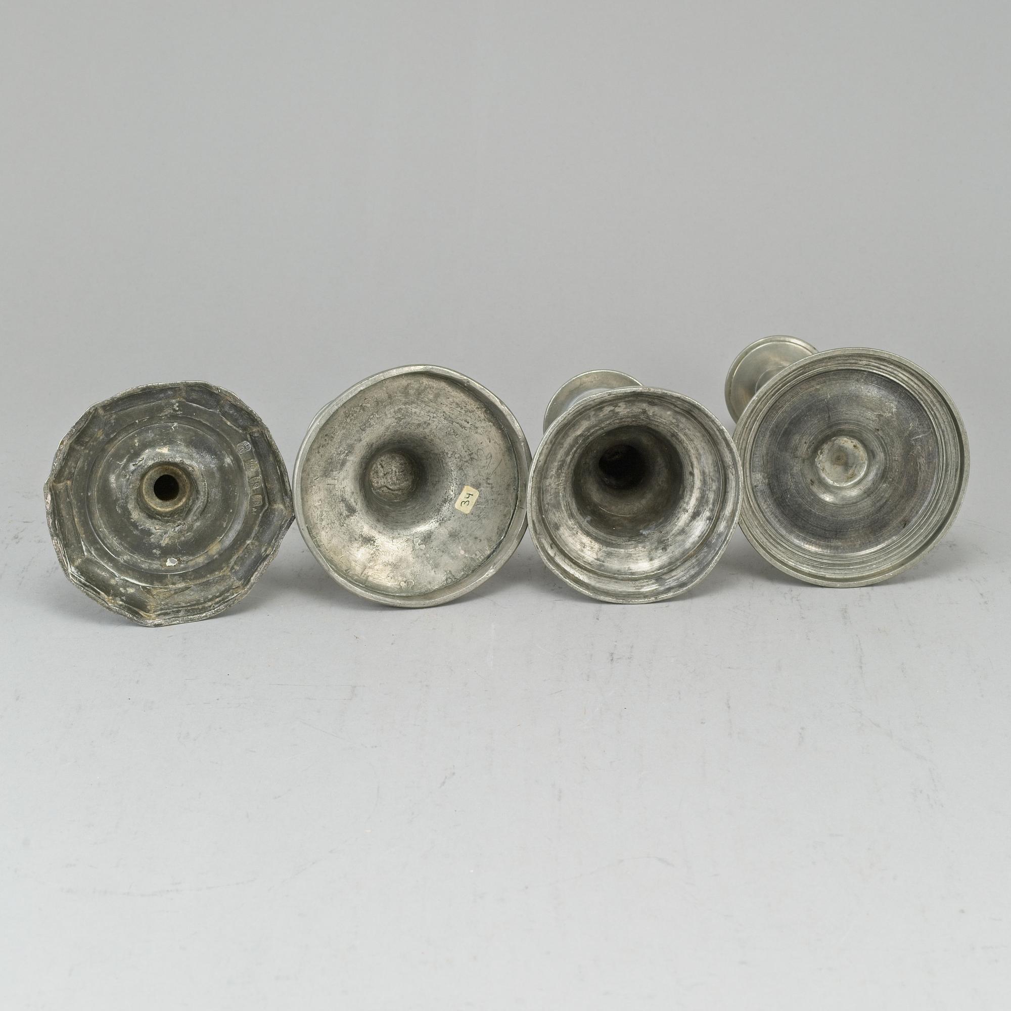 4 pewter candlesticks, 18-19th century.