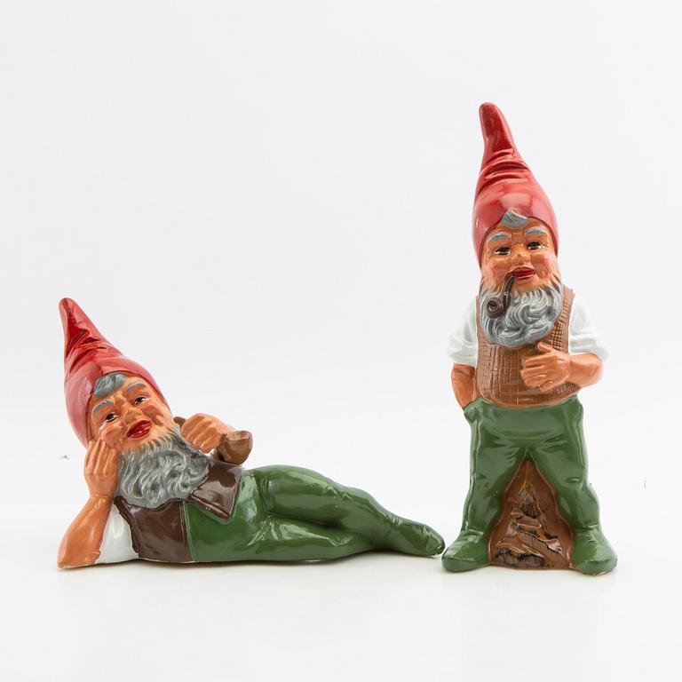 A collection of gnomes 12 pcs mid/late 20th century mostly painted terracotta.