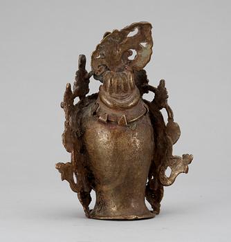 A bronze head of Buddha, probably Nepal.