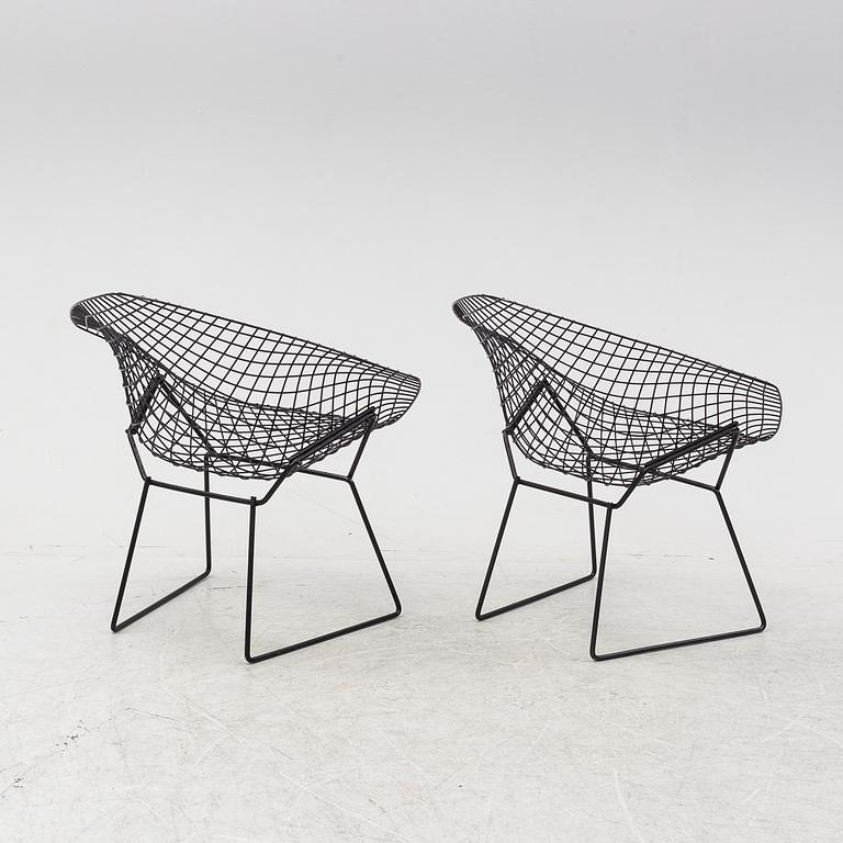 Harry Bertoia, a pair of metal lounge chairs, 1960's.