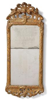 197. A rococo giltwood mirror by N. Meunier (master in Stockholm 1754-97).
