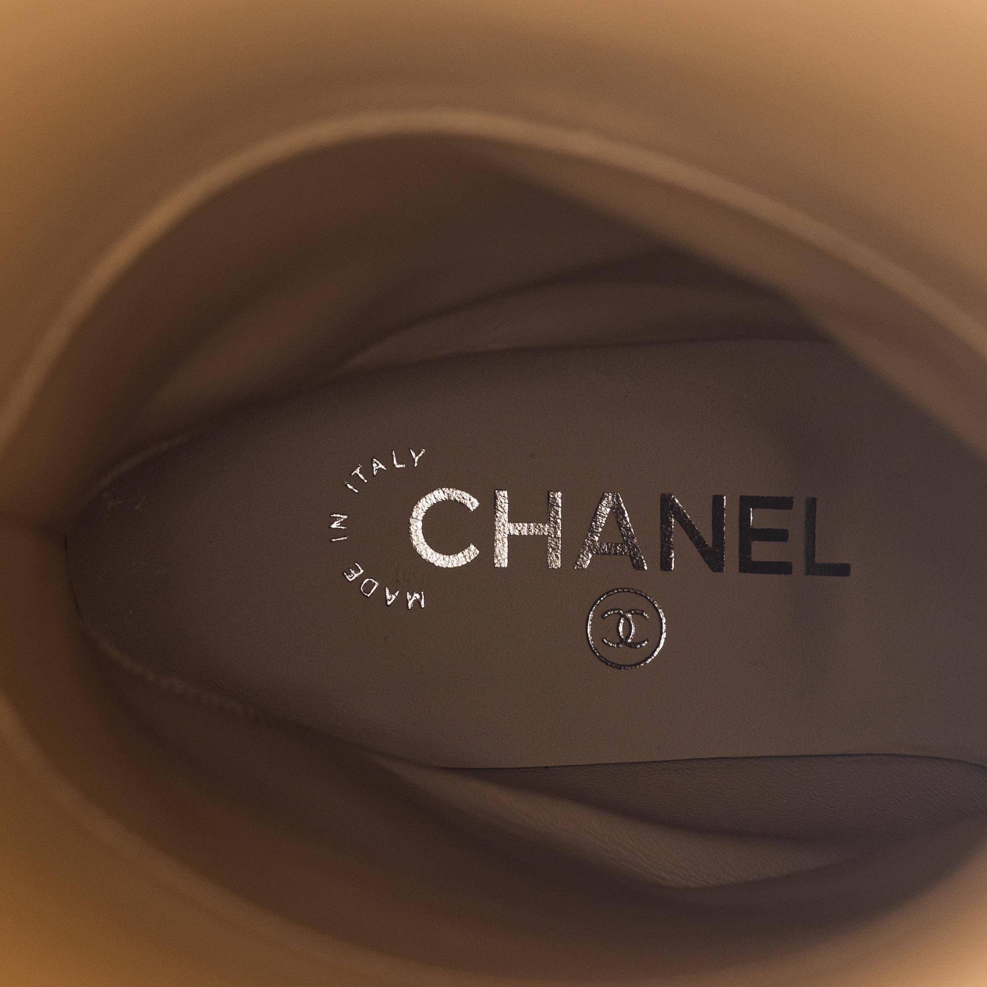 Chanel, a pair of sequin high boots, size 37.