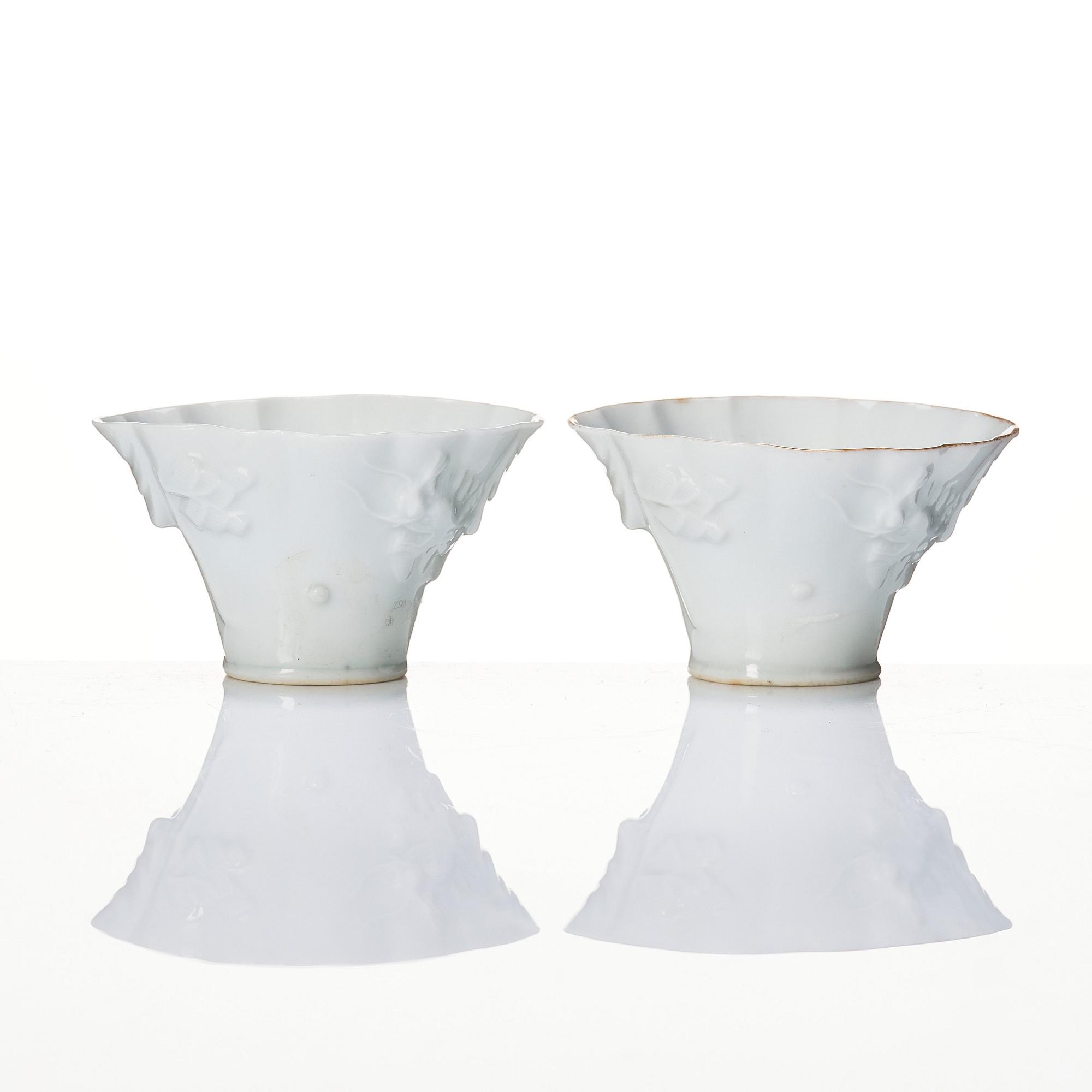 A pair of blanc de chine libation cups, Qing dynasty, 19th Century.