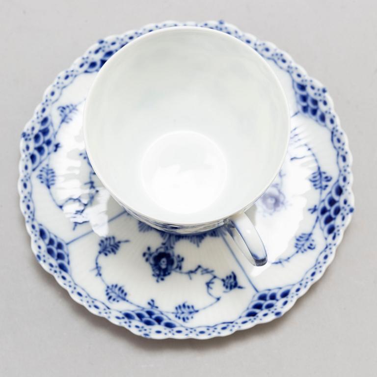 a 23 part porcelain service 'Musselmalet' by Royal Copenhagen.