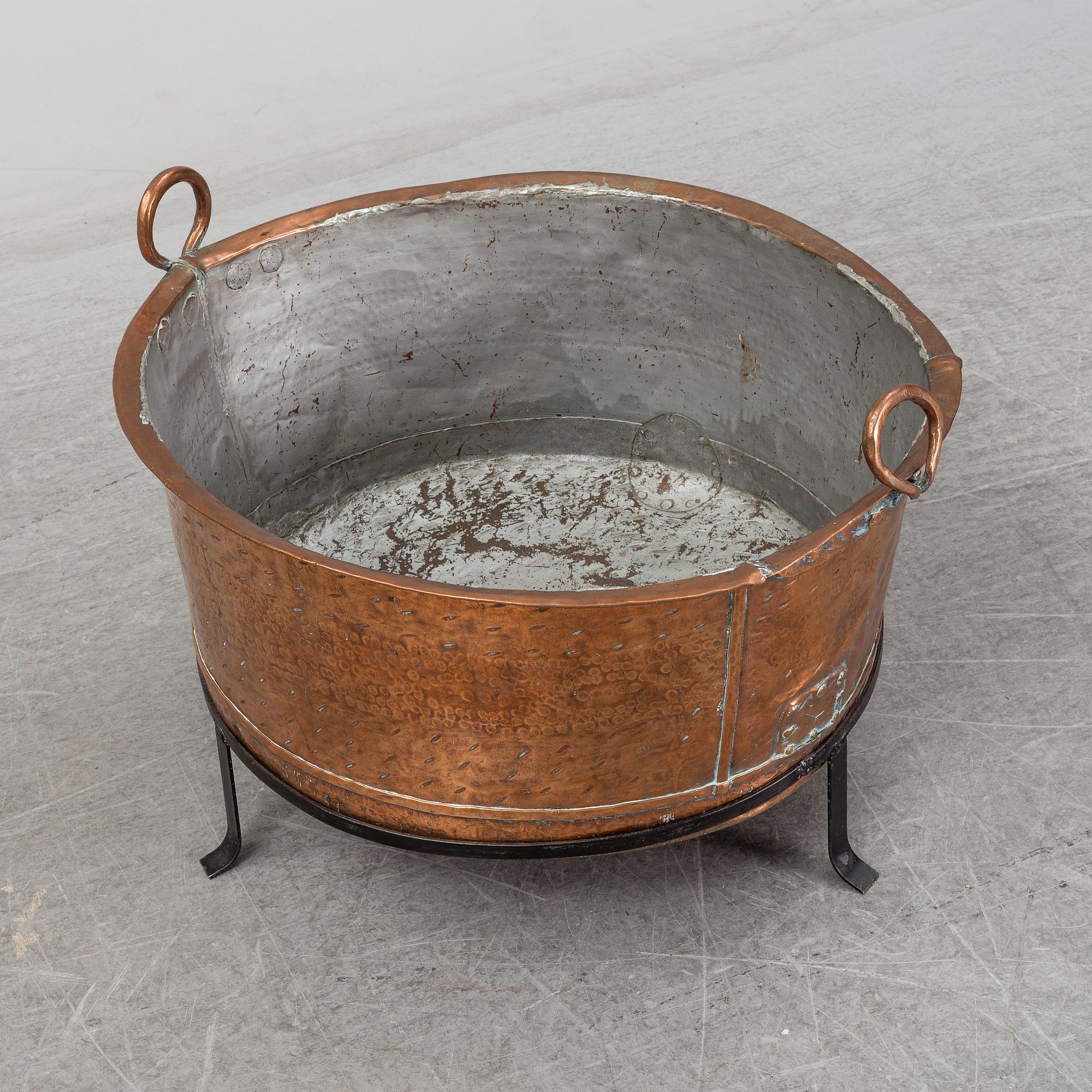 A copper pot, 19th Century.