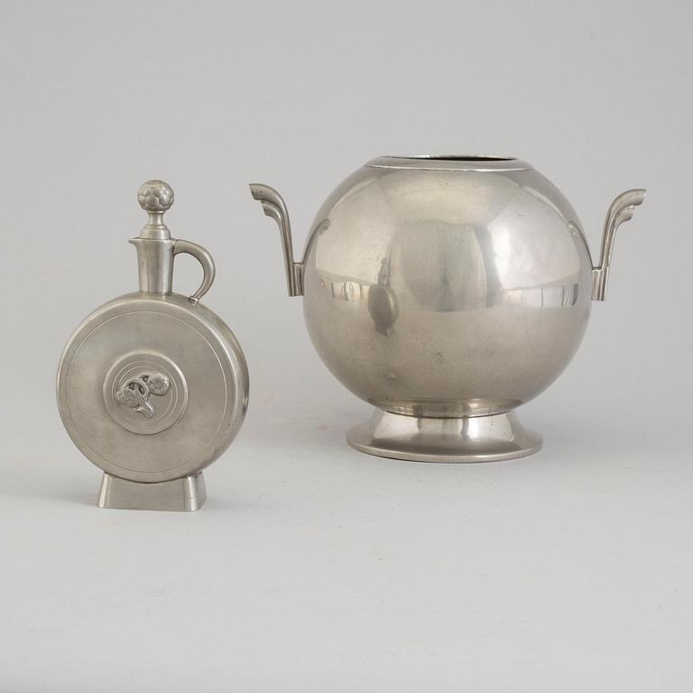 A 1930´s pewter vase and bottle.