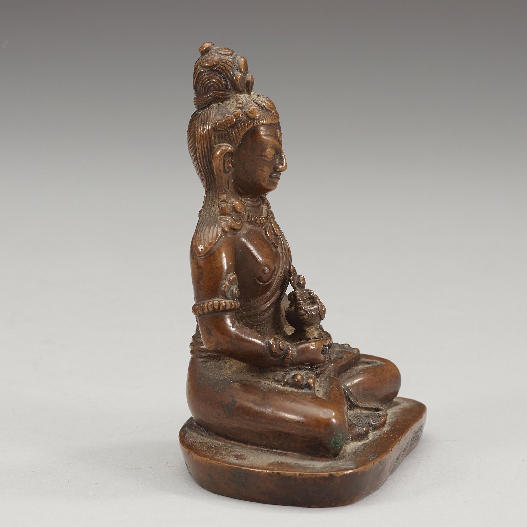 A copper alloy figure of Amitayus, Tibet/Nepal, presumably late 19th century/early 20th century.
