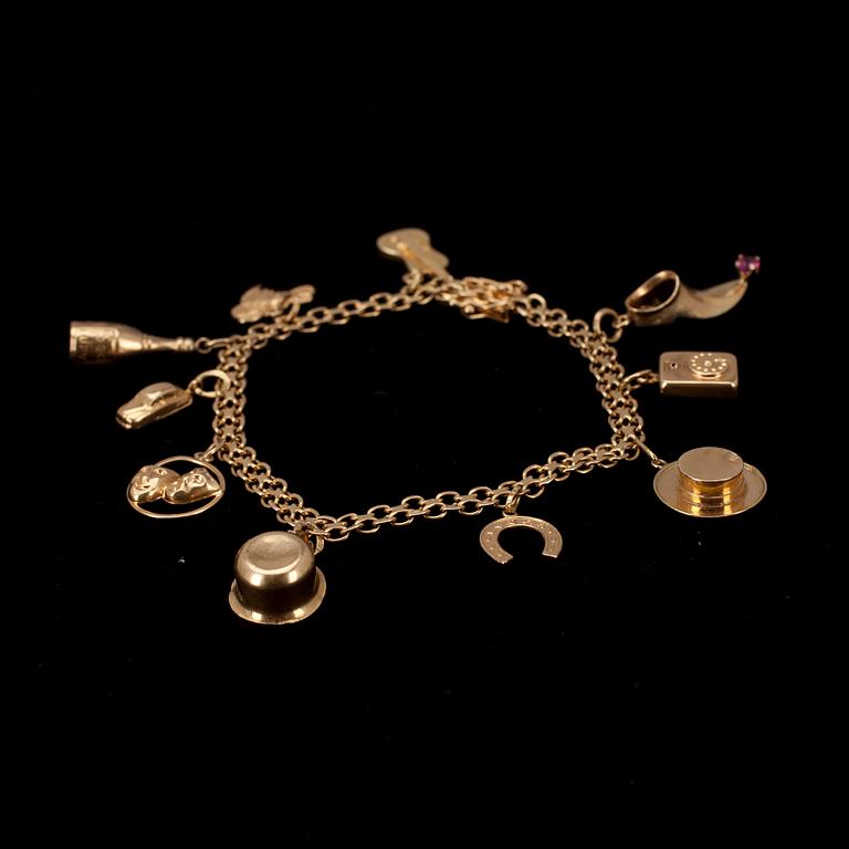 ARMBAND, med berlocker, 18k guld, Sverige 1962, tot. vikt 14 g.