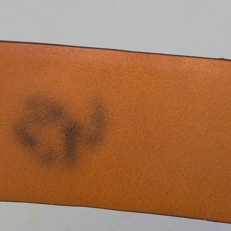 A chocolatebrown suede belt by Ralph LAuren.