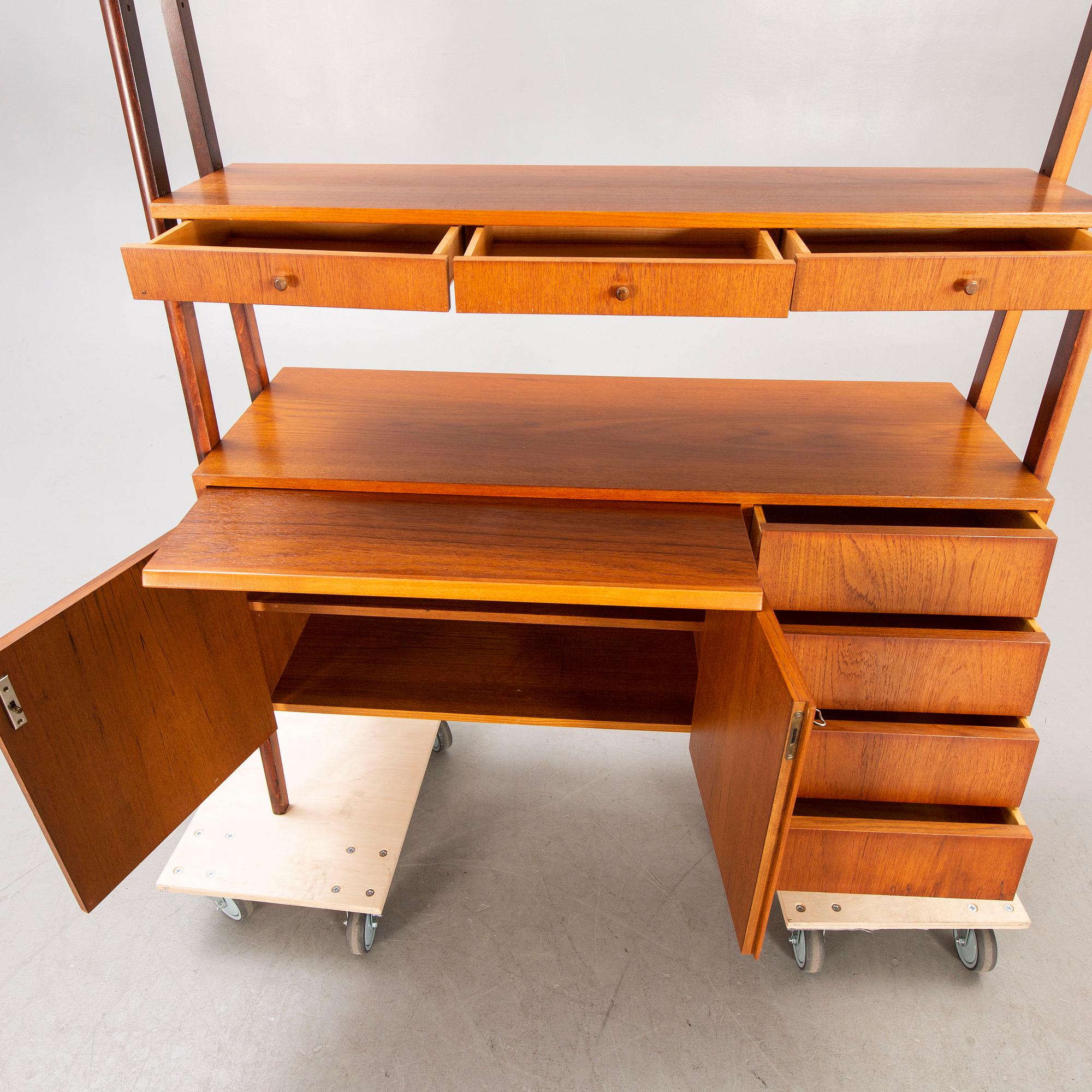 A teak mid 1900s book shelf.