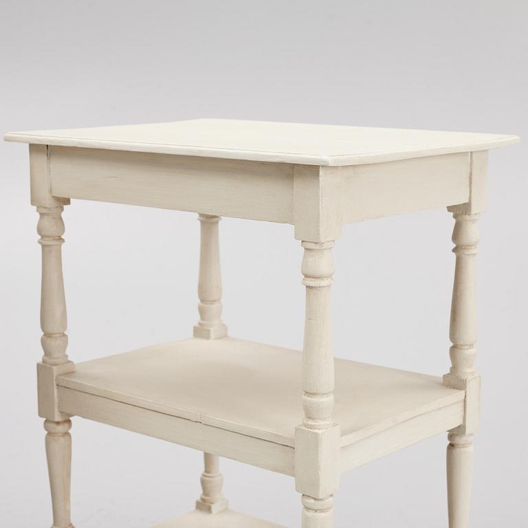 A pair of tables, circa 1900.