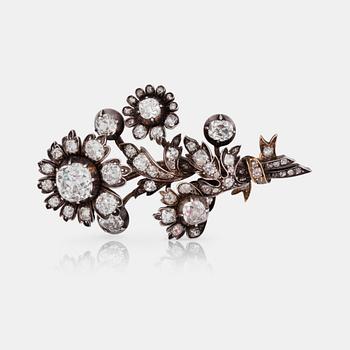 664. A Victorian antique-cut diamond brooch in the shape of a bouquet of flowers.