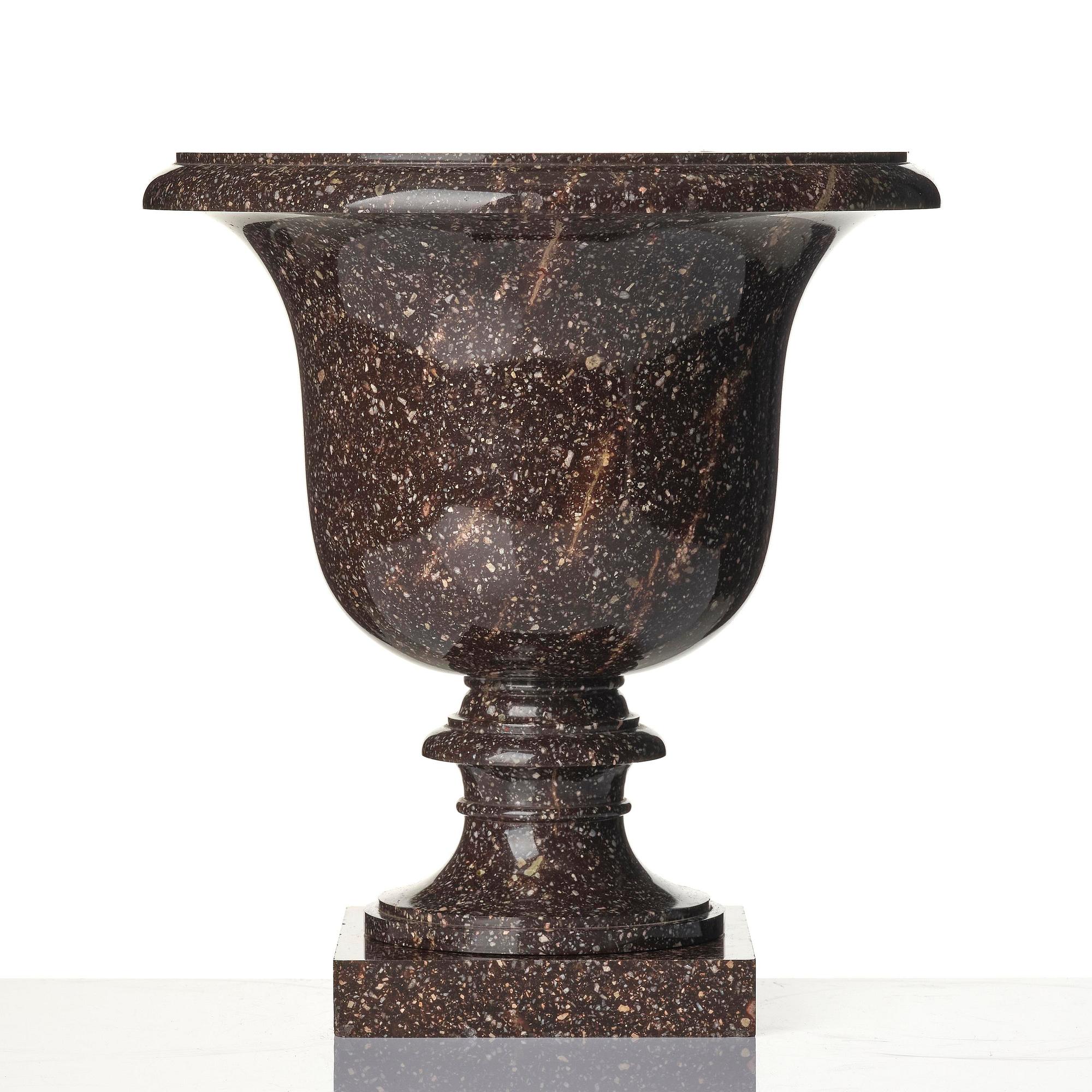 A Swedish Empire 'Blyberg' porphyry Medici shaped urn, early 19th century.