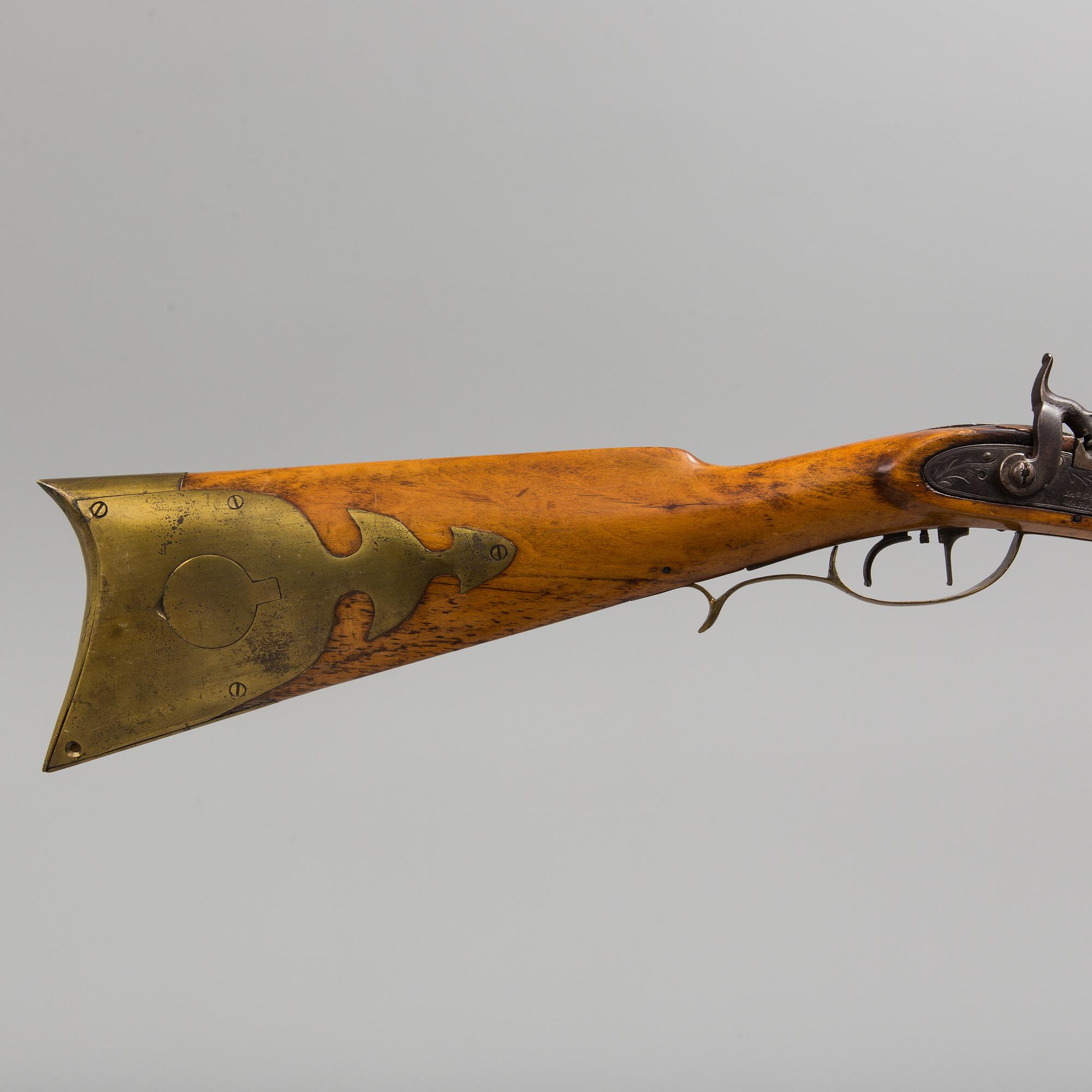 An early American 19th century percussion rifle ("Kentucky Longrifle")  from JAs GOLCHER WARRANTED,
