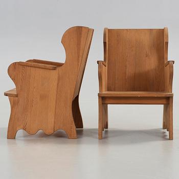 Axel Einar Hjorth, a pair of 'Lovö' stained pine armchairs, Nordiska Kompaniet, Sweden 1930's.