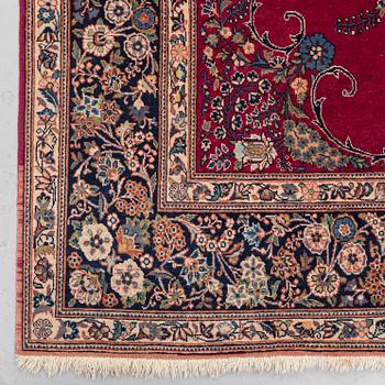 A RUG, semi-antique Kashan, around 210 x 136 cm.