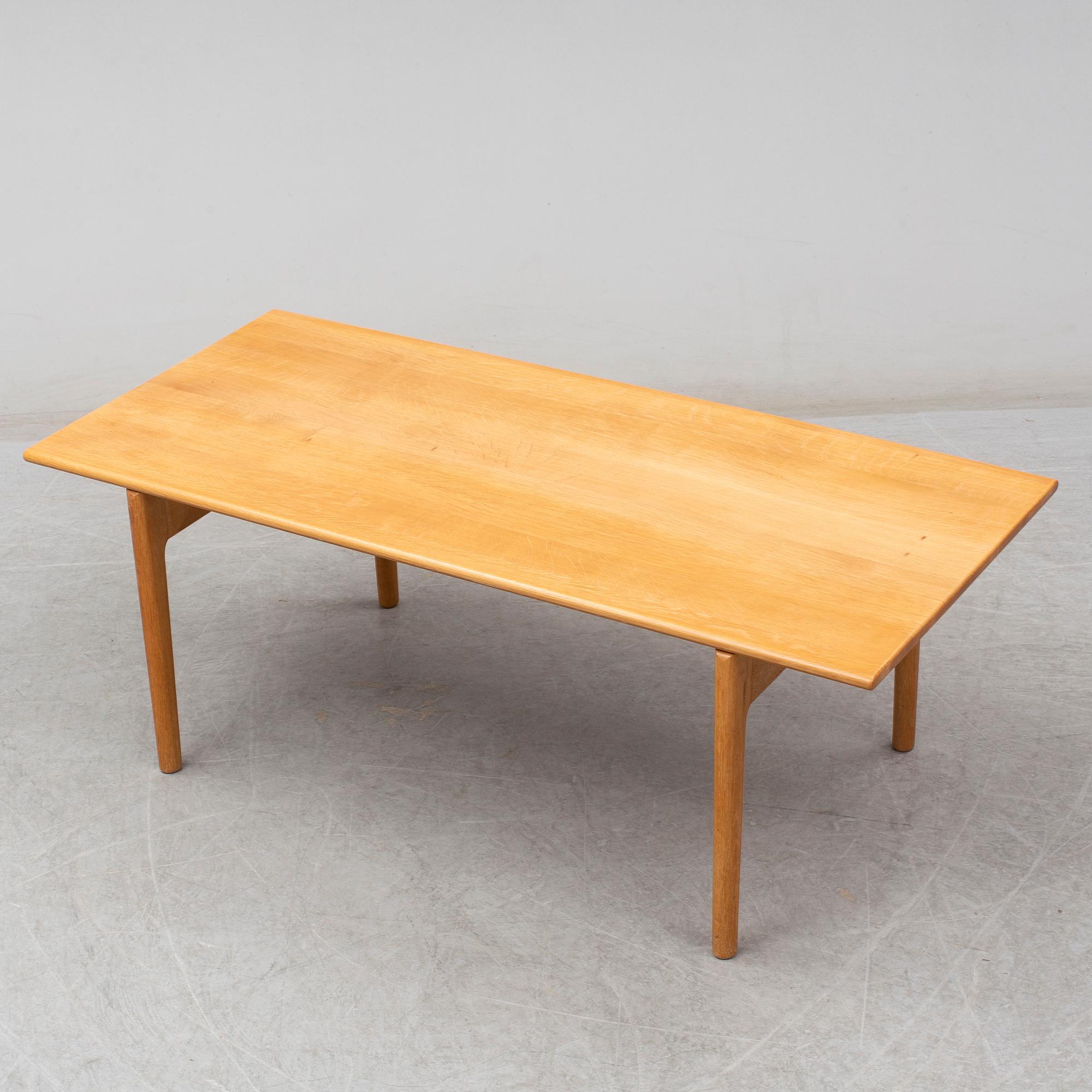 A second half of the 20th century oak coffee table by Hans J Wegner, Andreas Tuck, Denmark.