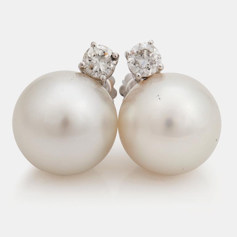 A pair of cultured South sea pearl and brilliant cut diamond earrings.