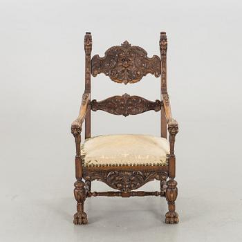 A BAROQUE STYLE ARMCHAIR CA 1900.