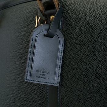 LOUIS VUITTON, a taiga leather 'Helanga' weekend bag.