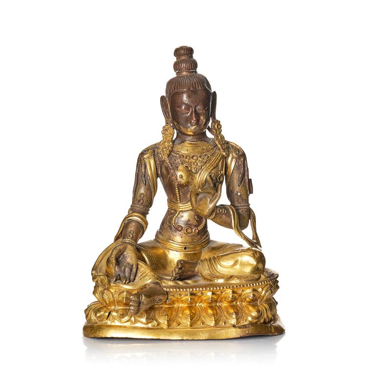 A gilt copper alloy figure of Tara, Tibet, circa 1800.