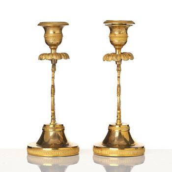 A pair of Swedish Empire ormula candlesticks.