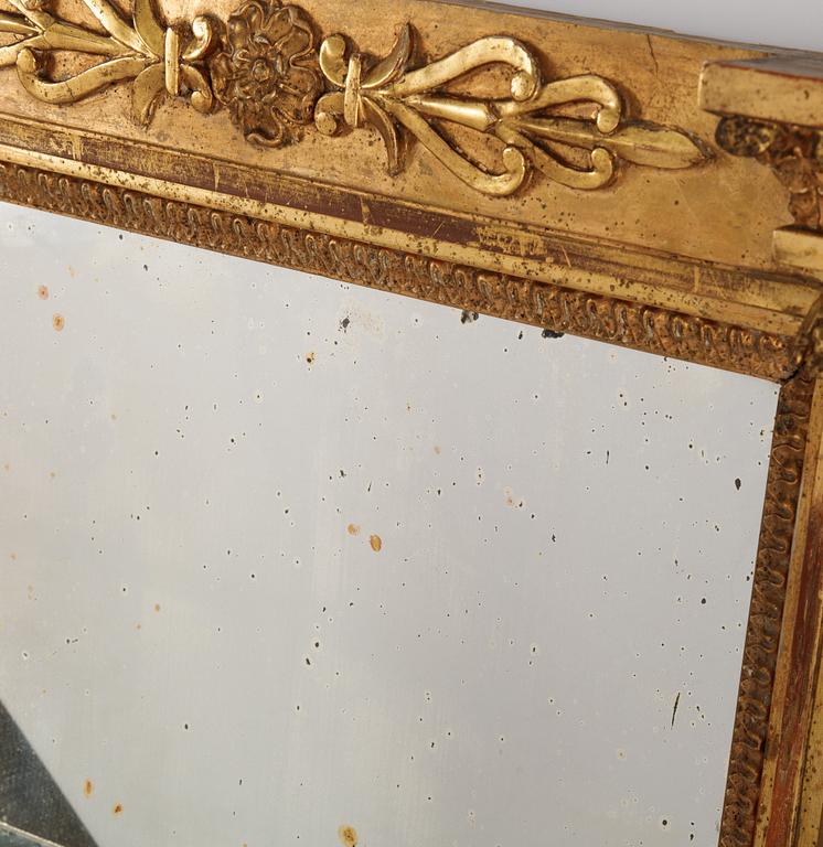 An Swedish Empire mirror, first half of the 19th century, attributed to Petter Gustaf Bylander, (Gothenburg 1802-59).
