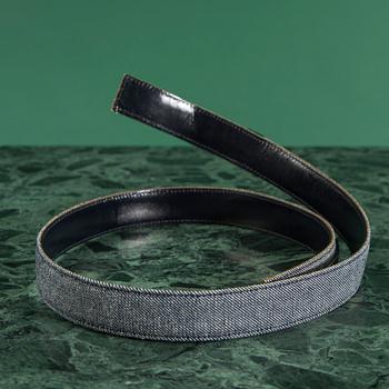 A belt and three bows, by CHANEL.
