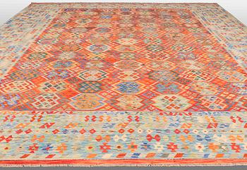 A CARPET, killim, ca 500 x 408 cm.