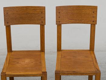 MARIO PRANDINA, an oak table and four chairs, Plinio Il Giovane, Italy.