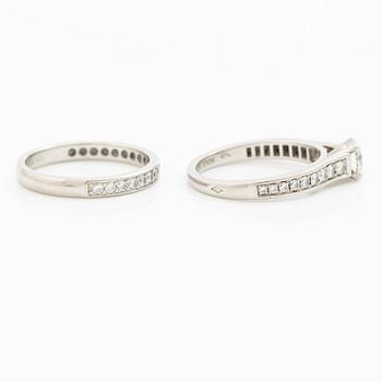 Cartier two rings platinum with round brilliant-cut diamonds.