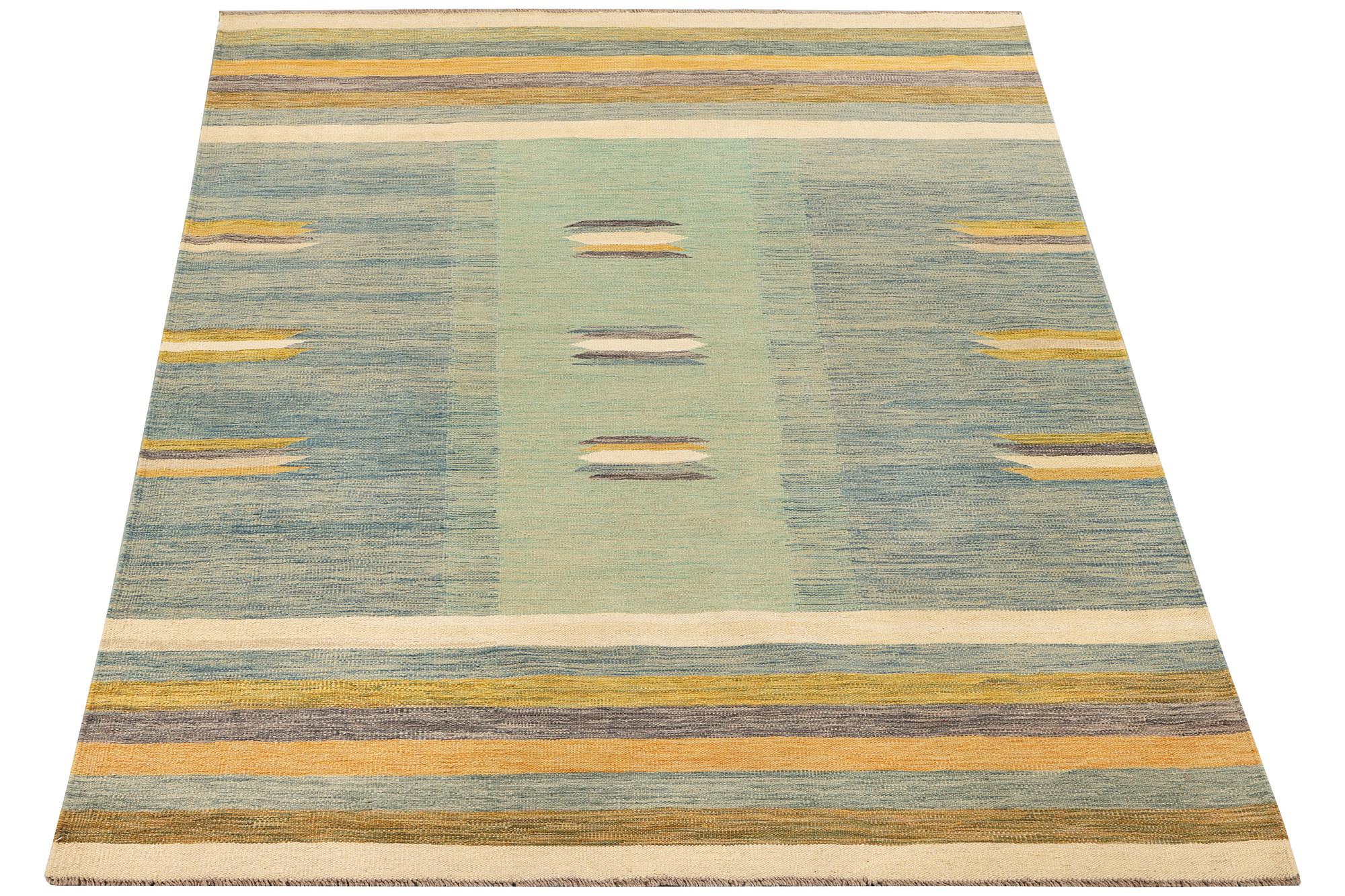 An Afghan kelim rug, c. 238 x 160 cm.