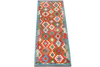 A runner carpet, Kilim, c. 290 x 81 cm.