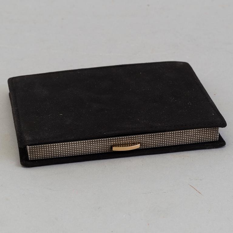 A parcel-gilt silver Dunhill cigarette case and a gold plated Dupont lighter from Paris.