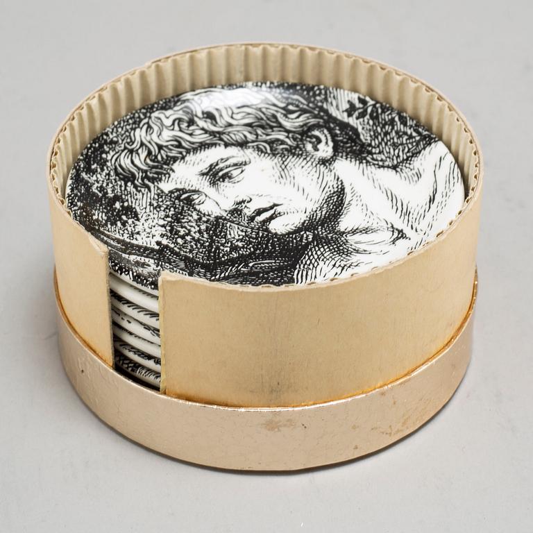 PIERO FORNASETTI, eight 'Adamo' porcelain coasters, Italy, 1965.