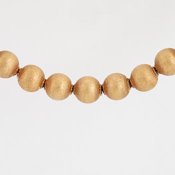 A 18K gold necklace made in Arezzo, Italy.