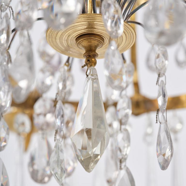 A late Gustavian gilt brass and cut glass eight-branch chandelier, Stockholm, late 18th century.