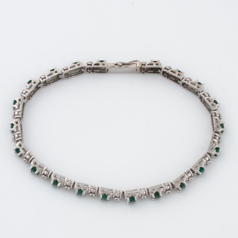 A emerald and single cut diamond bracelet.