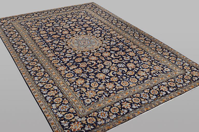 A carpet, Kashan, ca 348 x 237 cm.