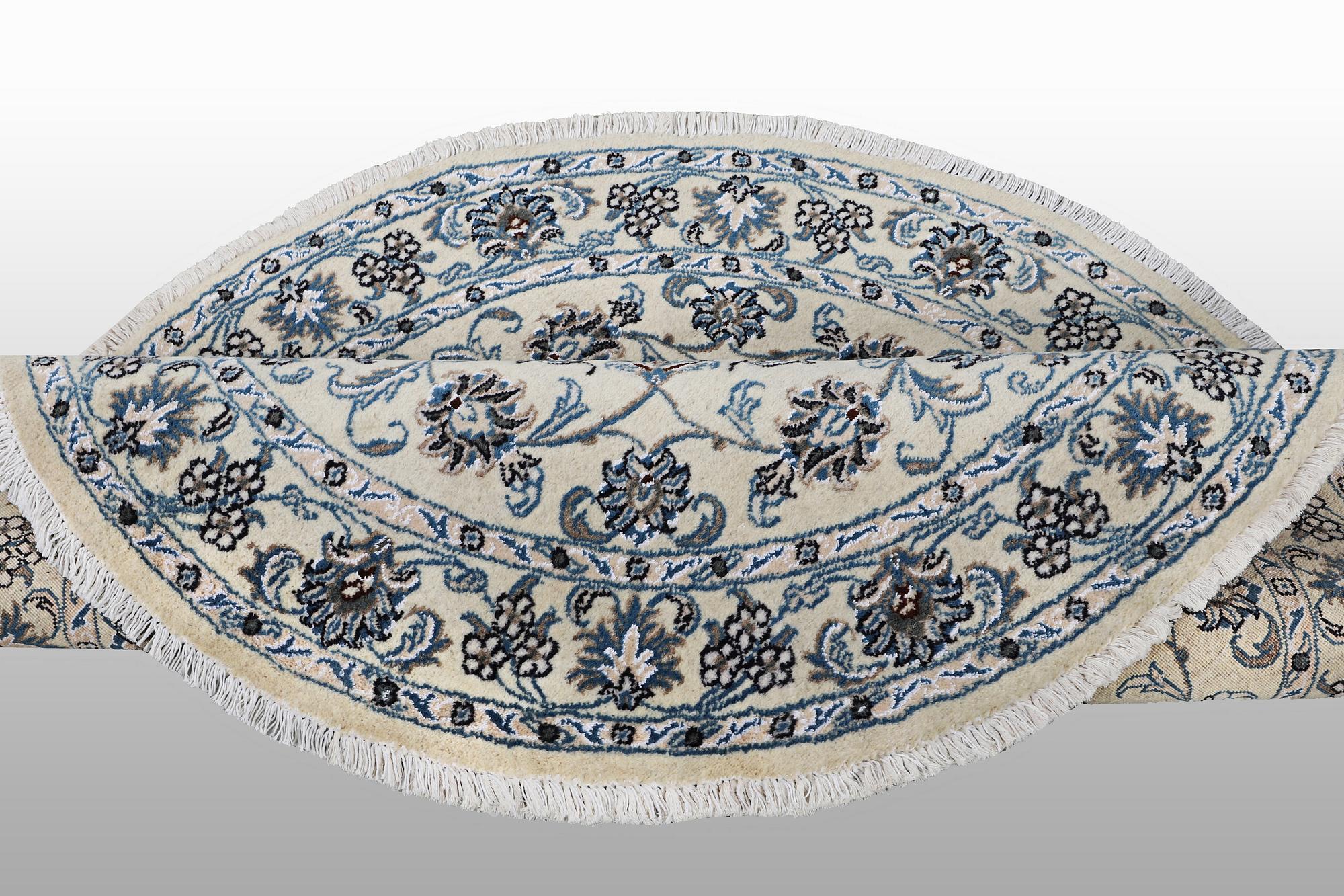 A rug, Nain, part silk, ca 316 x 136 cm.