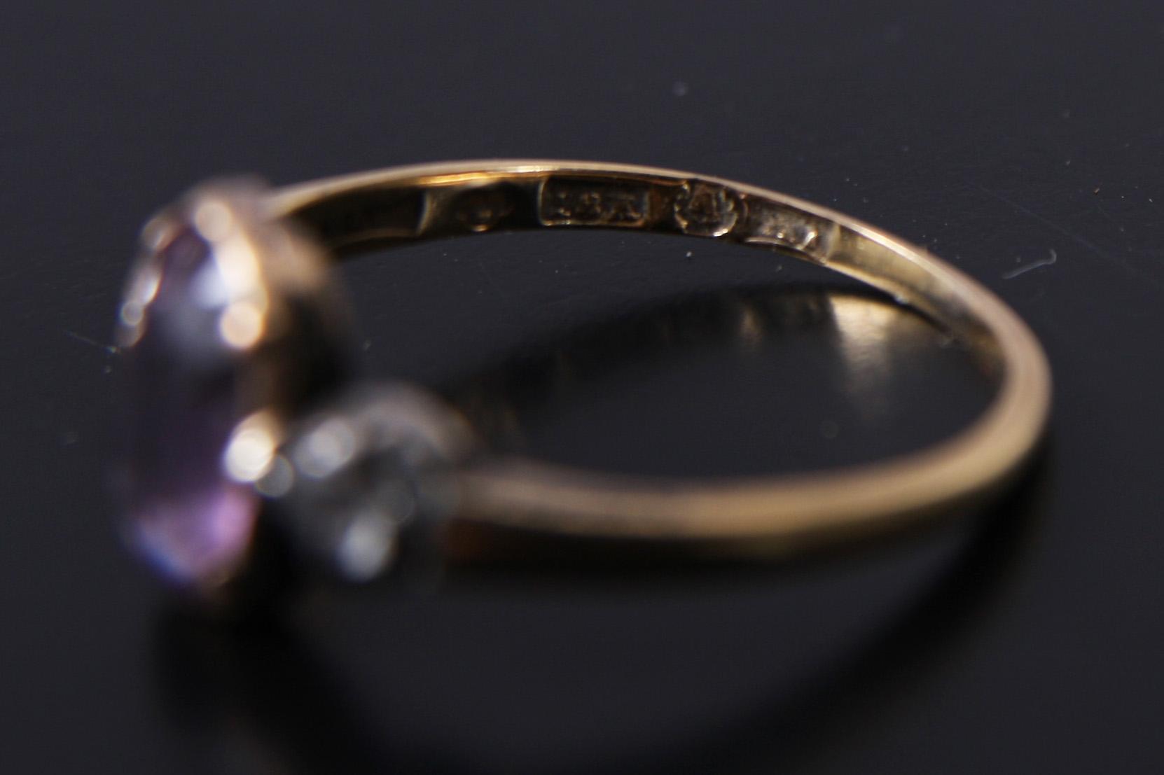 RING, guld 18 K m ametist o rosenstenar, 1920-tal.