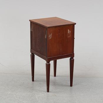 A mahogany bedside cabinet by Carl Johanssons Möbleringsaffär, around the year 1900.